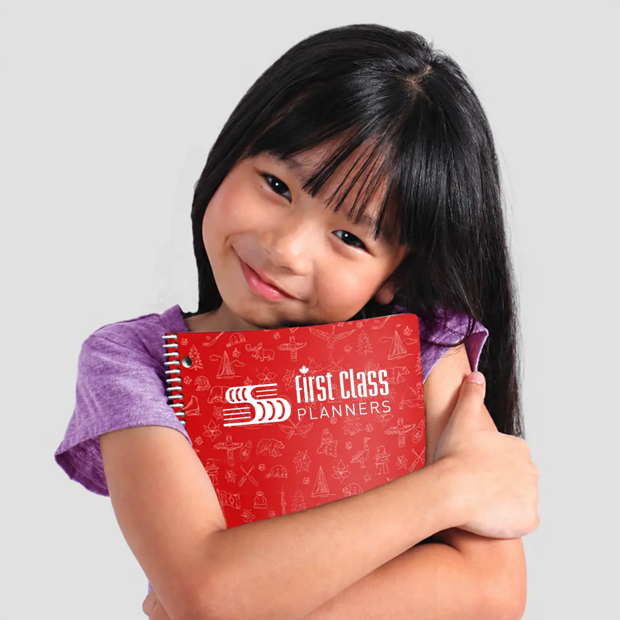 Student Hugging their Planner